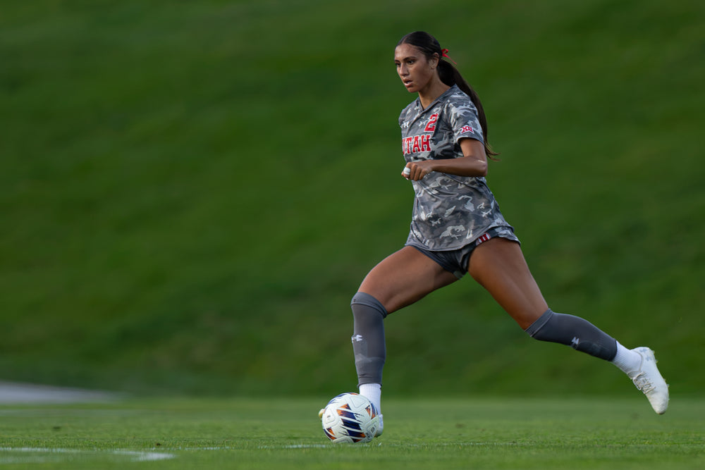 woman playing soccer